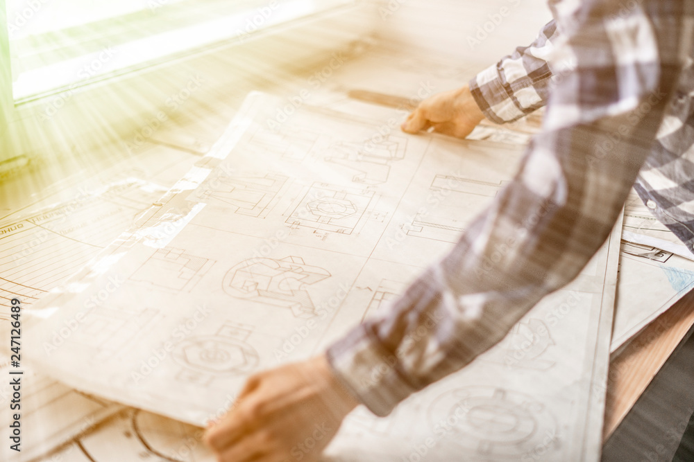 young male work with paper graphics b young male work with paper graphics b