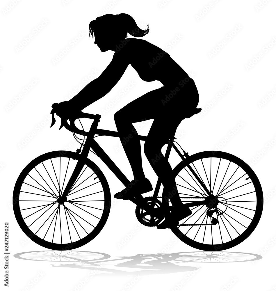 A woman bicycle riding bike cyclist in silhouette A woman bicycle riding bike cyclist in silhouette