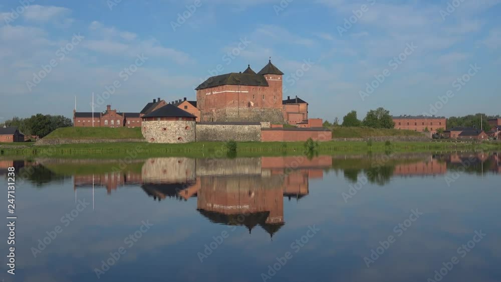 Ancient fortress-prison on lake Vanayavesi on July day. Hameenlinna, Finland