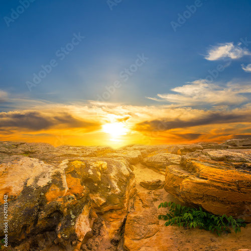 stony desert landscape at the dramatic sunset