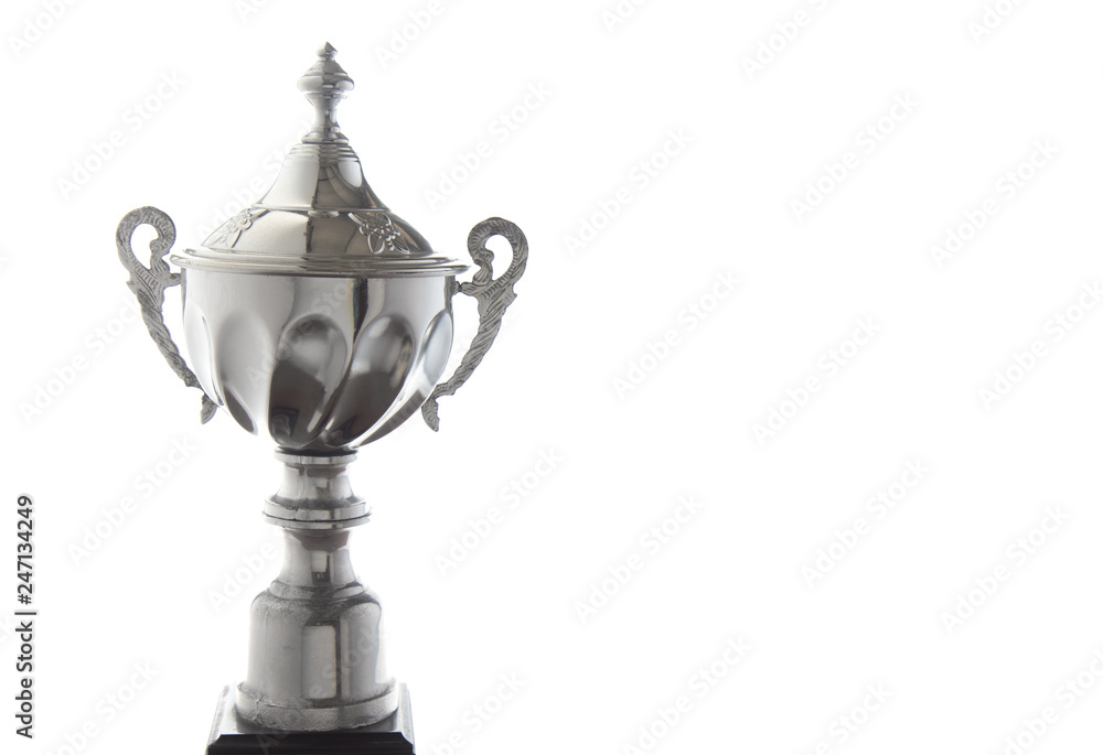 Close up of silver trophy isolated on white background. Winning awards with copy space.