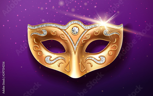 Colombina golden mask decorated with diamonds. Holiday masquerade masque or decoration for face at theater, opera. Part of italian or brazil festival costume. Fashion and entertainment theme