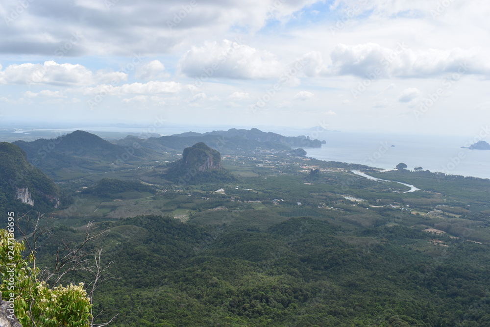 Panorama view from a big rock over Krabi at the jungle hiking trail to dragon crest in Khao Ngon Nak in Krabi, Thailand, Asia Panorama view from a big rock over Krabi at the jungle hiking trail to dragon crest in Khao Ngon Nak in Krabi, Thailand, Asia
