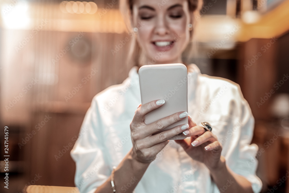 Focused photo on female hands that holding gadget Focused photo on female hands that holding gadget