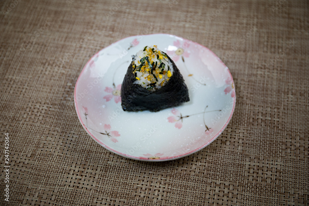 Close up view of plate with japanese food inside. Japan traditional food on wooden table. Close up view of plate with japanese food inside. Japan traditional food on wooden table.