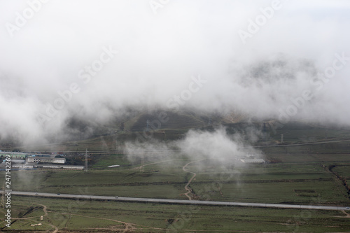 Morning fog in the mountain in Baku. Azerbaijan. Near Xojasan Lake.