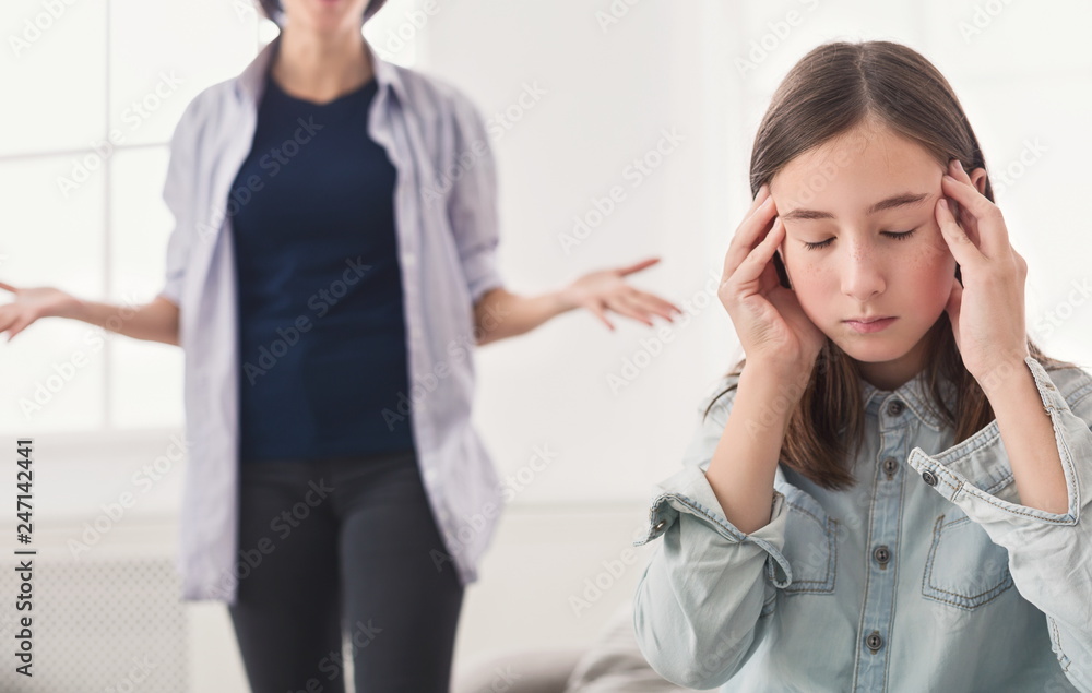 Fototapeta premium Quarrel between mother and daughter at home