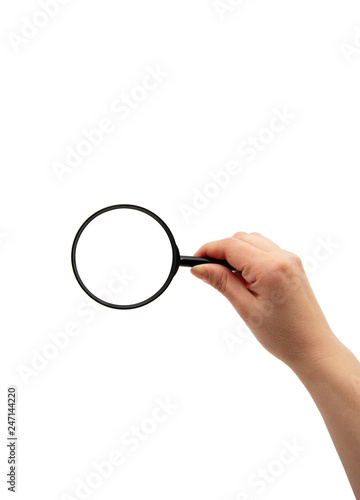 Hand holding magnifying glass isolated on white background