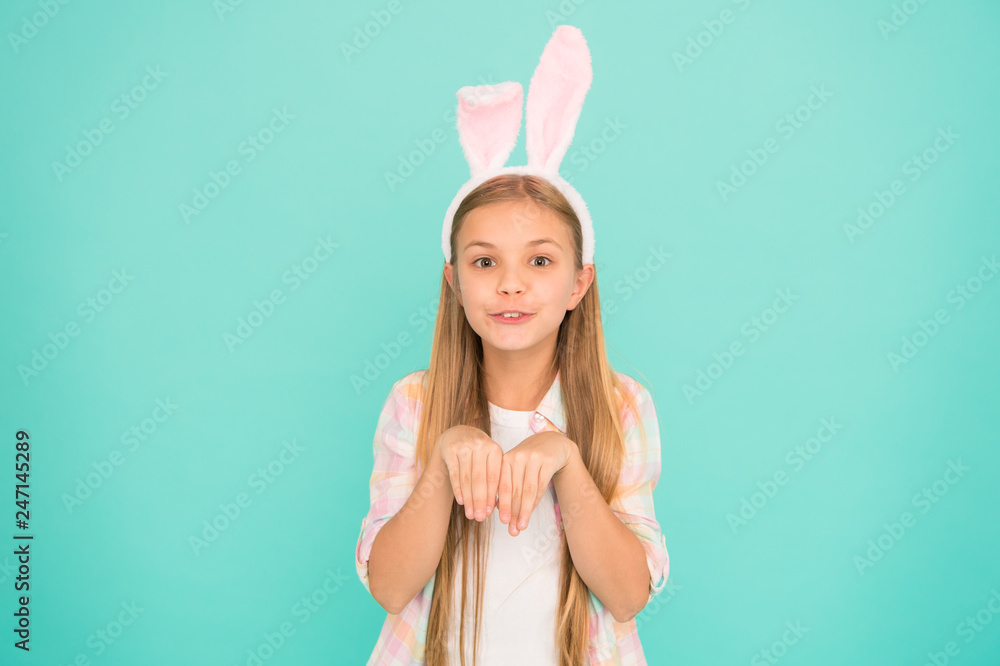Looking pretty in easter bunny attire. Fashion accessory for easter costume party. Cute little girl wearing bunny ears headband. Small girl child in easter bunny style. Bringing the spirit of easter
