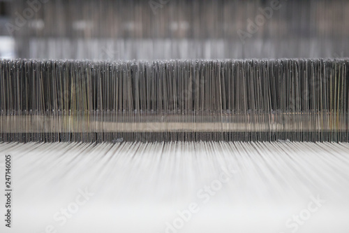 Cuadro en lienzo Yarn thread lines on the weaving loom machine