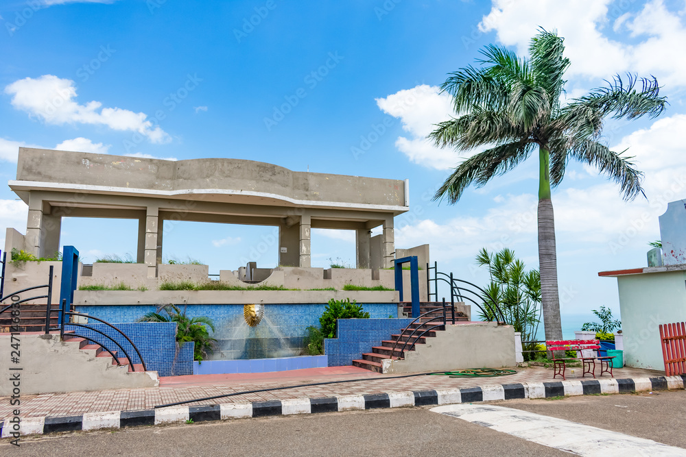 Fototapeta premium Shooting studio building with a coconut tree looking awesome.