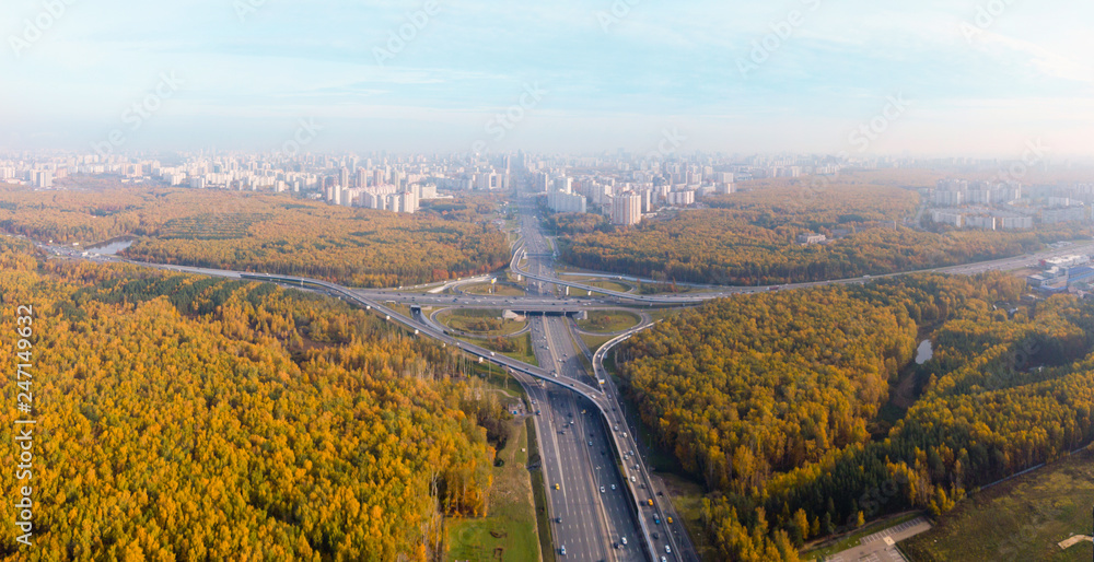 Top view of the multi-level road junction in Moscow from above, car traffic and many cars, the concept of transportation. road junction at the intersection of the Kievskoe highway and the ring road