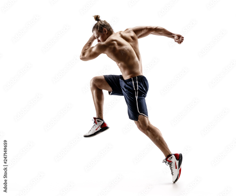 Handsome man runner in silhouette. Photo of shirtless muscular man isolated on white background. Dynamic movement. Side view. Full length