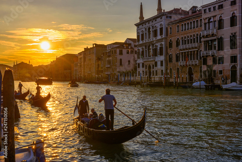 Grand Canal with gondolas in Venice, Italy. Sunset view of Venice Grand Canal. Architecture and landmarks of Venice. Venice postcard © Ekaterina Belova