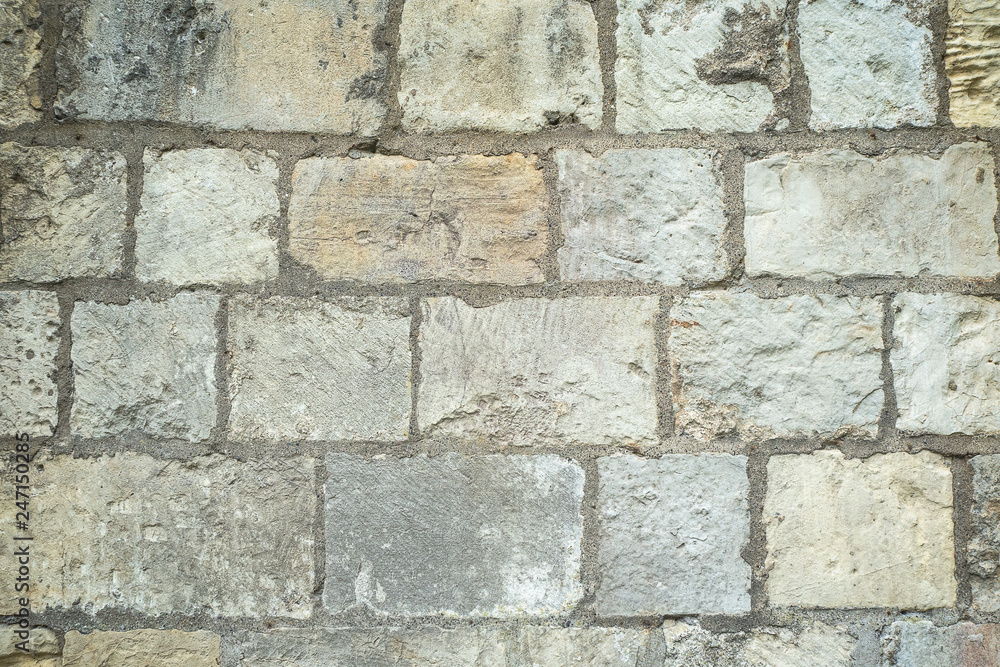 Fototapeta premium Ancient white brick block background and texture