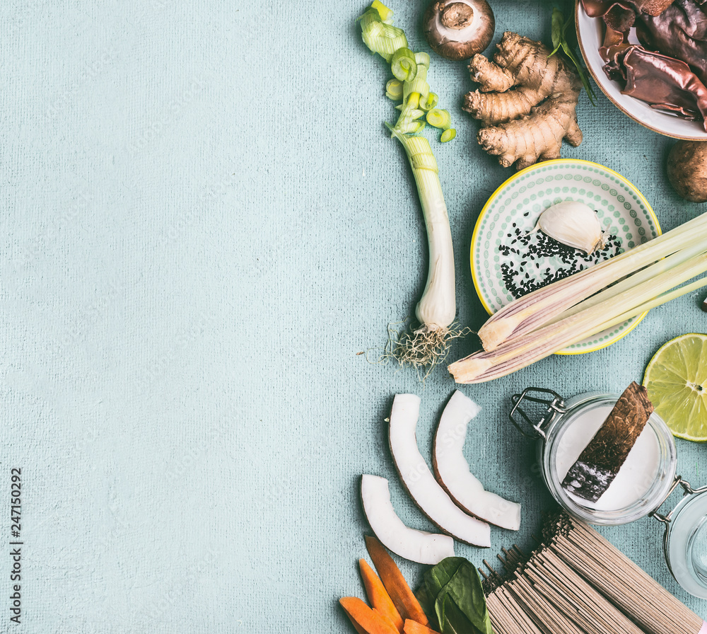 Φωτογραφία Asian food background with variety of traditional cooking ingredients: noodles, vegetables,mushrooms and spices, top view, flat lay