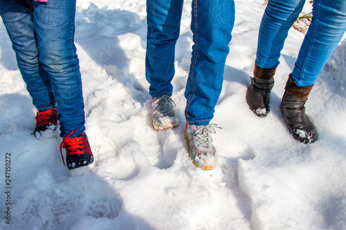 Girls walking in the snow, footprint in snow