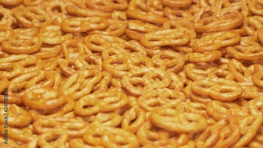 UHD closeup shot of the mini pretzels on a rotating stand UHD closeup shot of the mini pretzels on a rotating stand