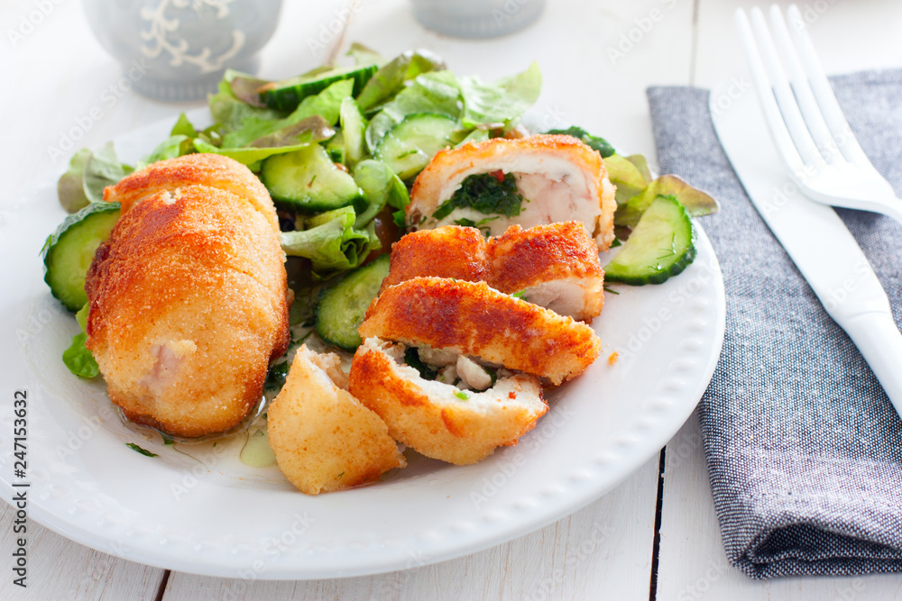 Chicken Kiev cutlets with filling, selective focus Chicken Kiev cutlets with filling, selective focus