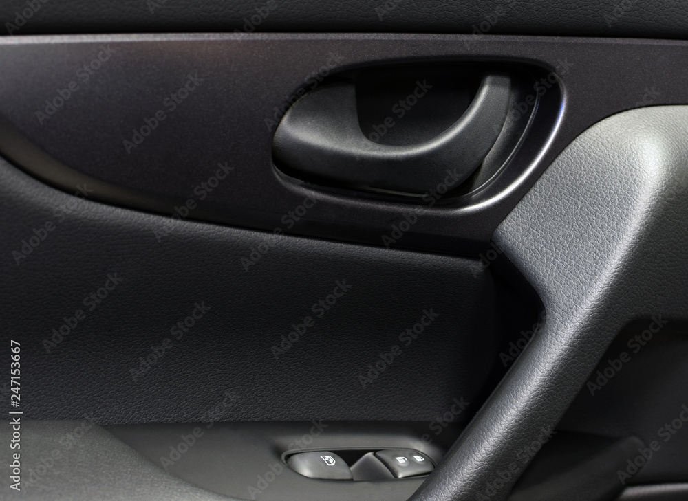 Interior details of modern car door.