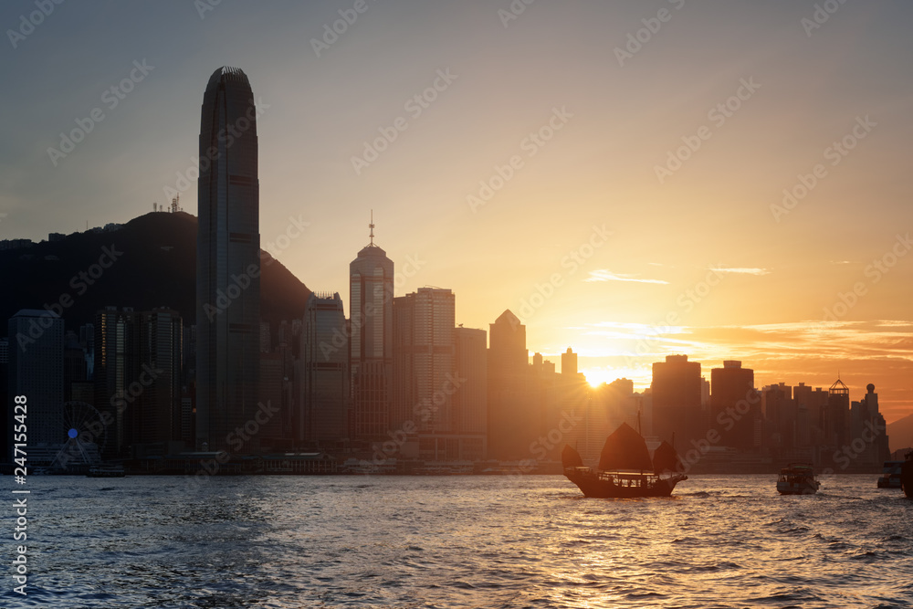 View of skyscrapers in downtown of Hong Kong at sunset