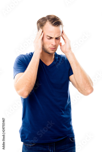 Young man heaving headache