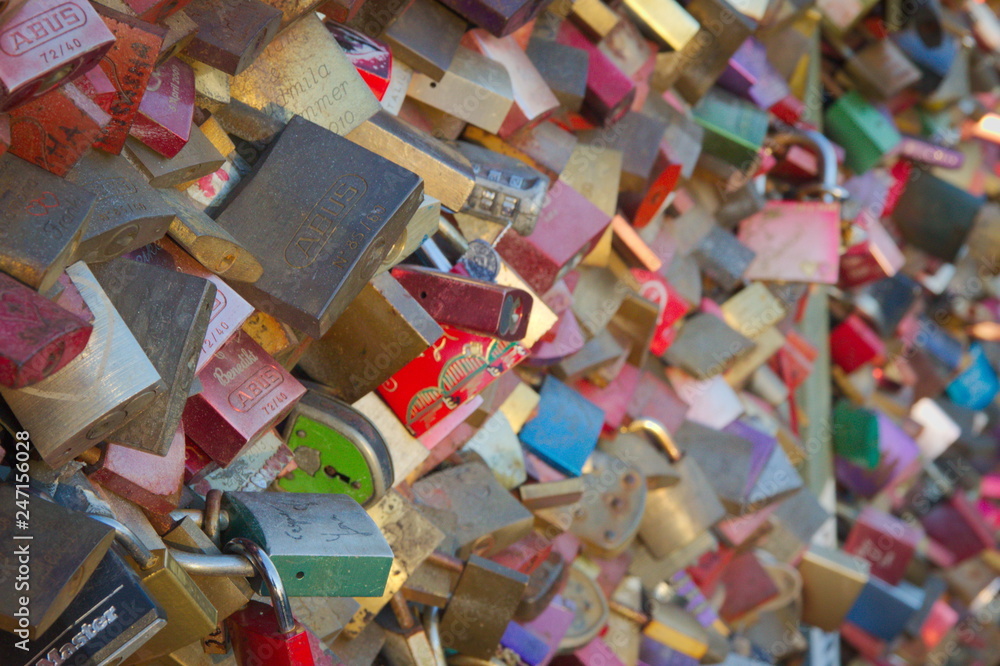 lovelock padlocks with love messages an a bridge in cologne