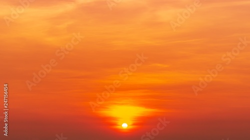 Nature background of the sunrise on the orange sky © c_atta