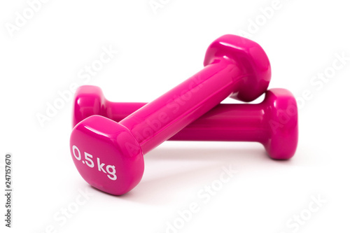 Two pink dumbbells isolated on white background