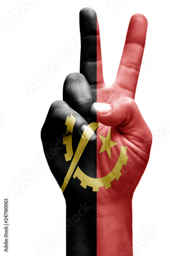 and making victory sign, Angola painted with flag as symbol of victory, win, success - isolated on white background