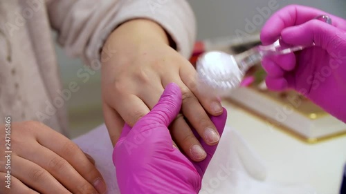 Wallpaper Mural Nail dusting with a special soft brush, manicure in process. Concept for beauty salon Torontodigital.ca
