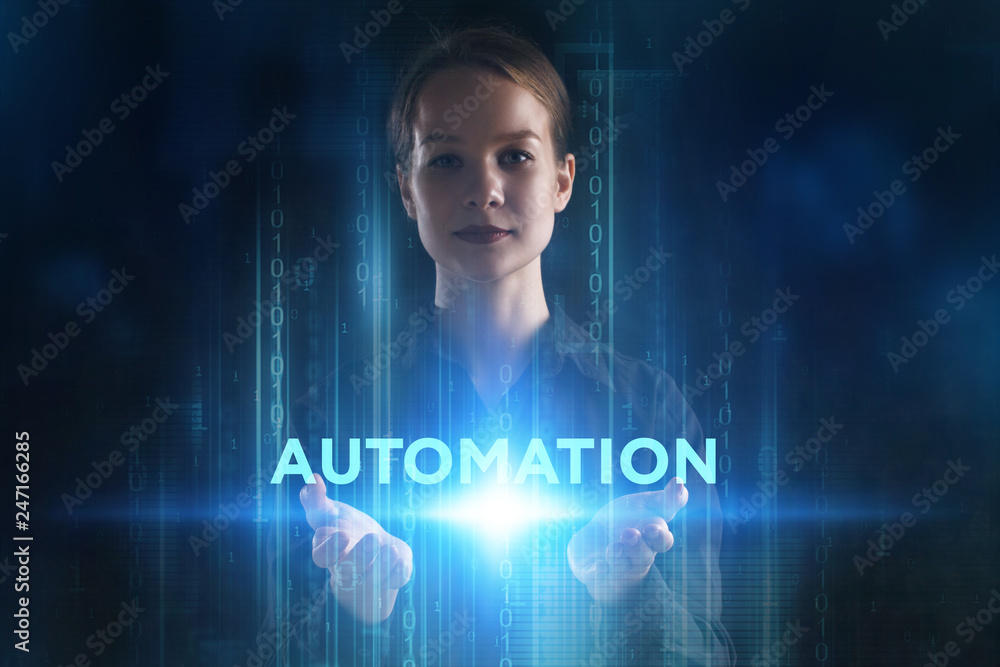 The concept of business, technology, the Internet and the network. A young entrepreneur working on a virtual screen of the future and sees the inscription: Automation The concept of business, technology, the Internet and the network. A young entrepreneur working on a virtual screen of the future and sees the inscription: Automation