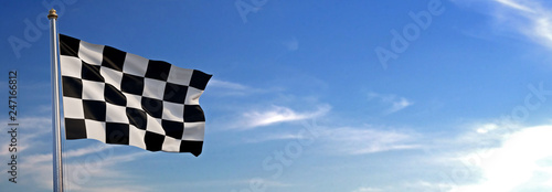 Foto Car race rise waving to the wind with sky in the background