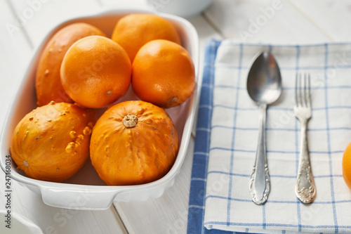 oranges and pumpkins on the table before cooking