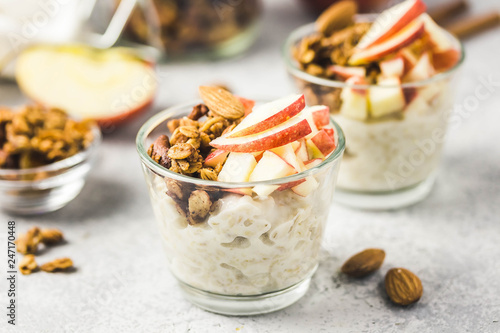 Spiced apple cinnamon overnight oats, healthy breakfast. Selective focus, space for text. photo