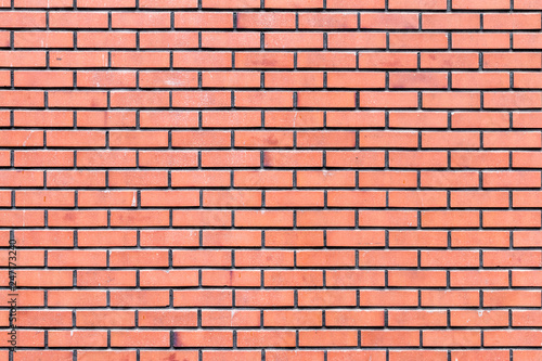 mur en briques rectangulaires rouges et multicolorés