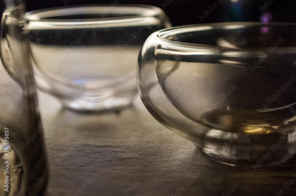 Vacuum glass tea cup for chinese puer tea, close-up, macro Vacuum glass tea cup for chinese puer tea, close-up, macro