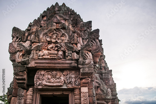 Carved stone facade Narai Bantomsin lintel of Phanom Rung castle in Buriram, Thailand photo