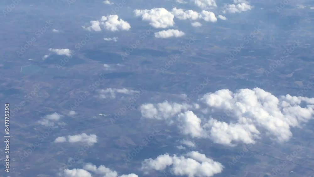 View of the clouds and the city in Tunisia from the plane window View of the clouds and the city in Tunisia from the plane window