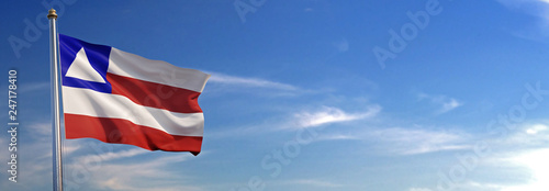 Obraz na płótnie Bandeira do Bahia subir acenando para o vento com o céu ao fundo