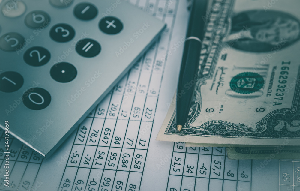 Money and Calculator, business concept. American dollars counting cash. Money and Calculator, business concept. American dollars counting cash.