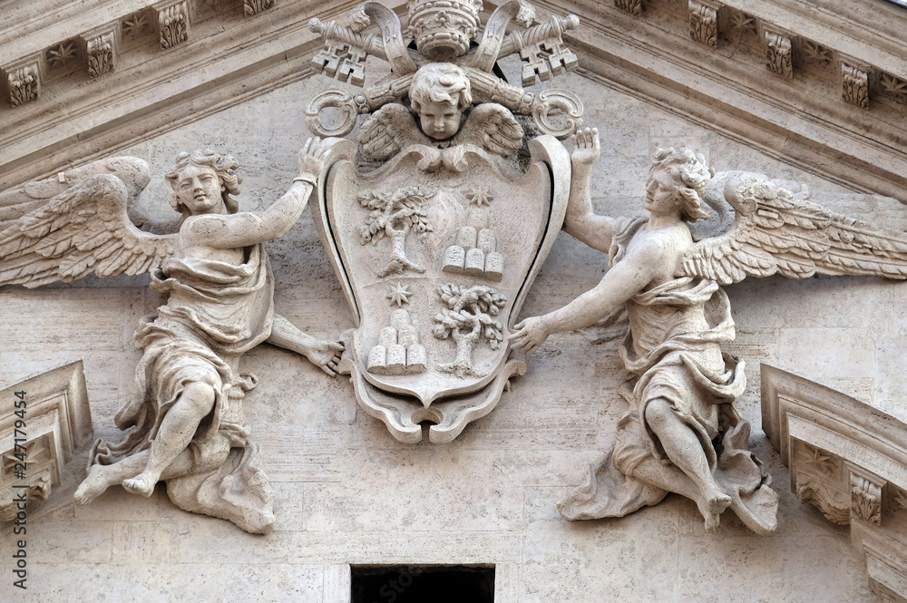 Coat of arms of Pope Alexander VII Chigi on the portal of Sant Andrea della Valle Church in Rome, Italy 