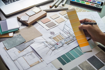 Architect designer Interior creative working hand drawing sketch plan blue print selection material color samples art tools Design Studio