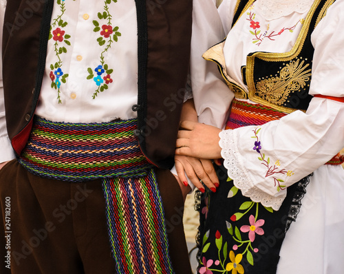 hands of woman in traditional clothes