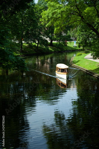 Dinghy at pilsetas kanals (city pond) on a summer day, Riga, Latvia