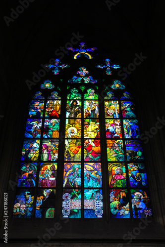 Beautiful colorful old gothic stained glass window in St. Vitus cathedral, Prague, Czech Republic