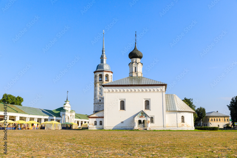 Resurrection Church and the central square in the summer morning. Russia, Suzdal. Gold ring.