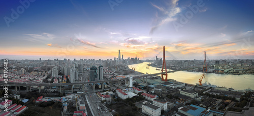 Aerial view of Yang Pu bridge at sunset in Shanghai
