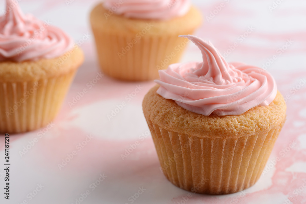 closeup pink cupcake with shallow DOF