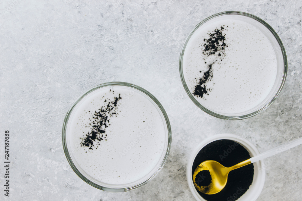 Black charcoal latte. Detox drink. Selective focus Black charcoal latte. Detox drink. Selective focus